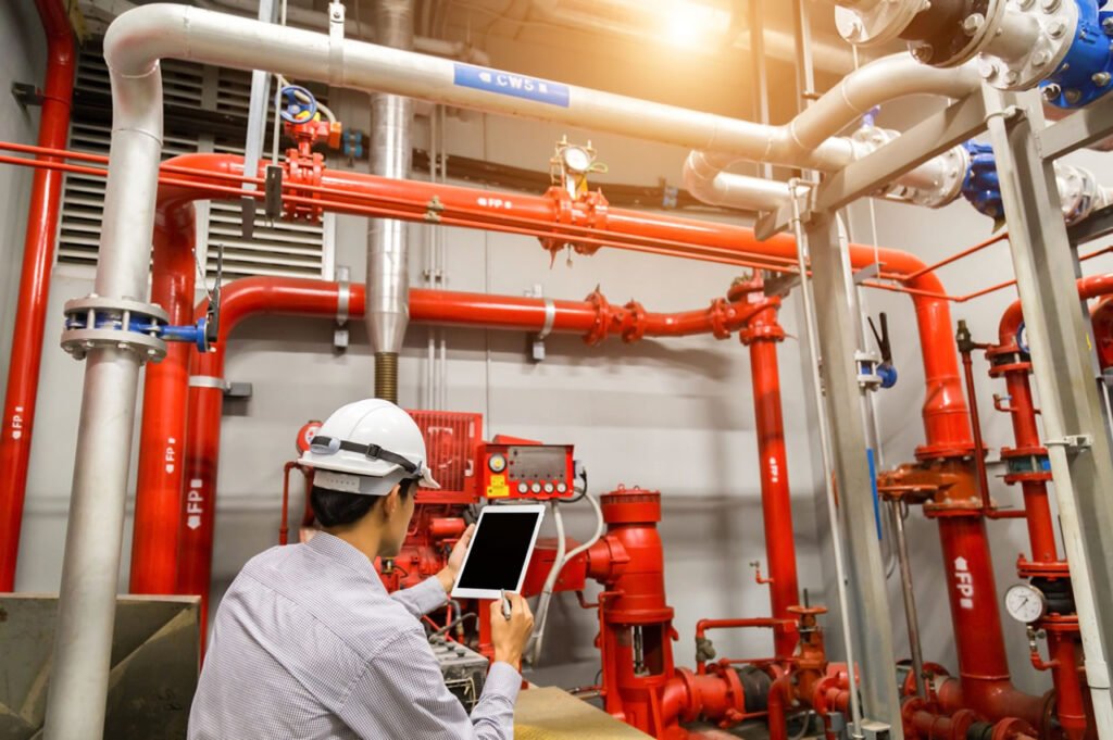 Fire fighting pump room with red pipework